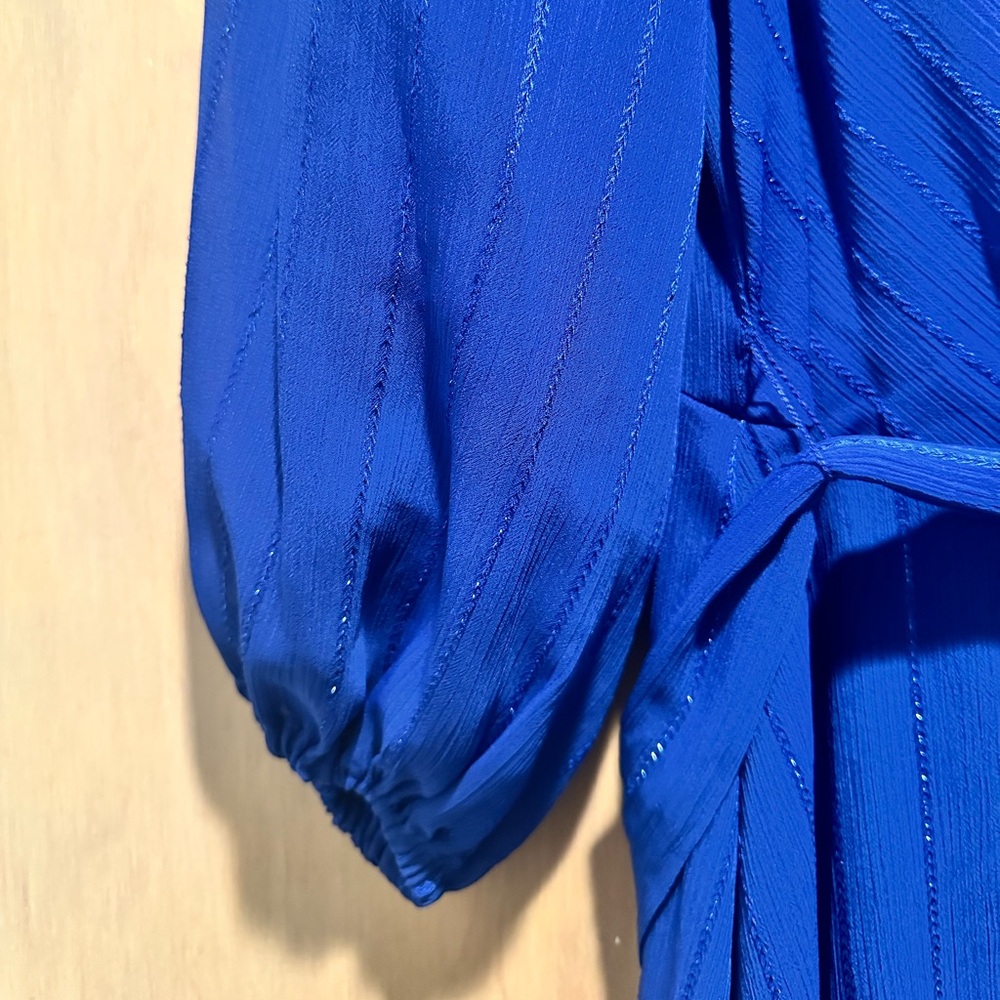 DKNY Blue “fake” wrap w/ belt.
handkerchief hem/midi length - Picture 4 of 5